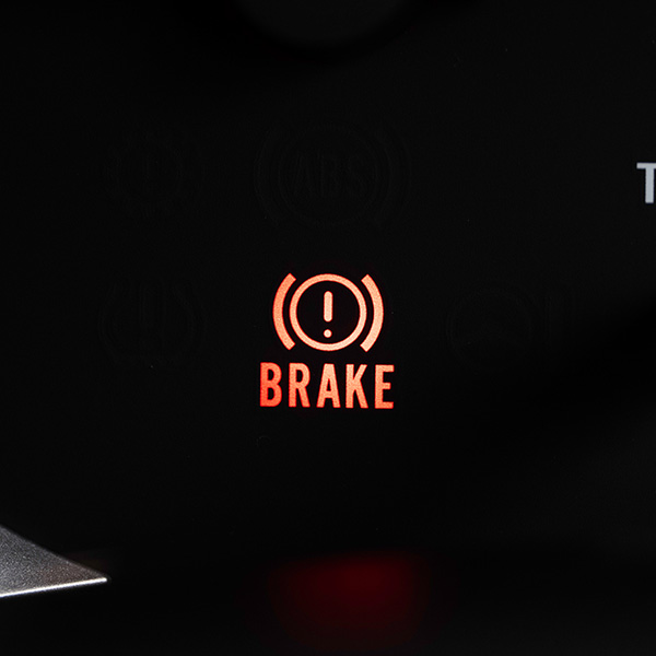 Brake light signal icon on the car panel